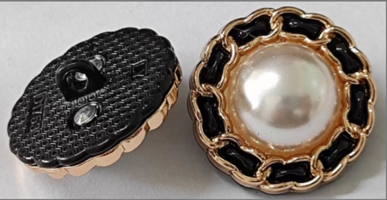 Pearl-effect decorative garment buttons with metal and cord details