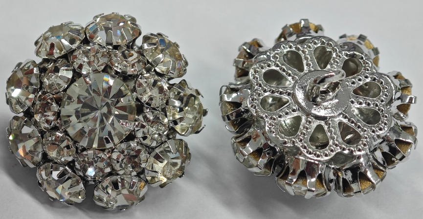 Alloy garment buttons with faceted crystal-effect decorative details